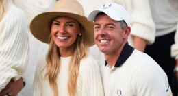 Erica's last laugh: Rory McIlroy's wife grabs a champagne glass to...