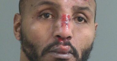 Ex-NFL star is seen with blood pouring down his face in police footage