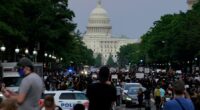 FBI fires agents photographed kneeling during 2020 racial justice protest, AP sources say