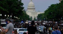 FBI fires agents photographed kneeling during 2020 racial justice protest, AP sources say