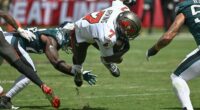 Fake tush push and special teams TD help Eagles beat Bucs 31-25 to stay undefeated