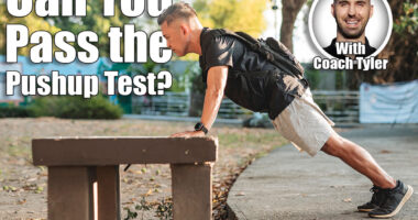 Middle aged Southeast Asian man doing incline pushups on a concrete bench while wearing a loaded rucksack for resistance training. If You Can Do This Many Pushups After 50, Your Upper Body Strength Is Elite. Cover
