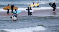 'Large shark' kills man at Australian beach, with witness describing hearing screams of 'don't bite me!'
