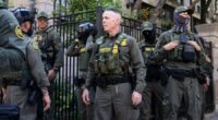 Masked federal agents patrol downtown Chicago