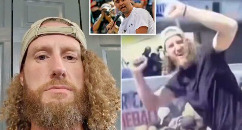 Mystery bearded man who appeared to cheer shooting of Charlie Kirk claims he chanted 'USA' to create 'distraction'