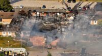 Police remain on scene at burned out Michigan church after shooting and fire leave 4 dead, 8 wounded
