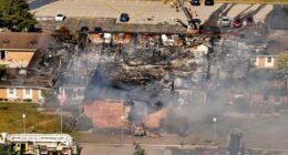 Police remain on scene at burned out Michigan church after shooting and fire leave 4 dead, 8 wounded