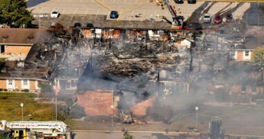 Police remain on scene at burned out Michigan church after shooting and fire leave 4 dead, 8 wounded