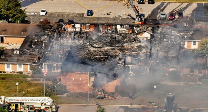 Police remain on scene at burned out Michigan church after shooting and fire leave 4 dead, 8 wounded