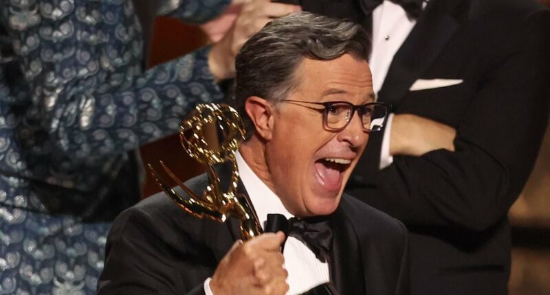 Stephen Colbert receives standing ovation as he delivers speech