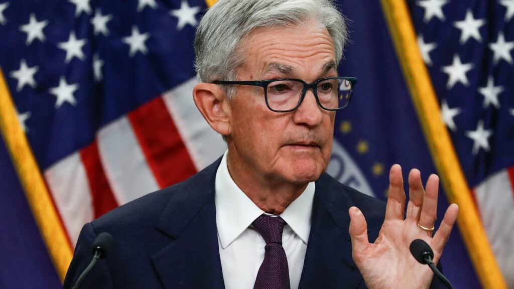Stocks fall from all-time highs as Fed chair warns of unseen risk