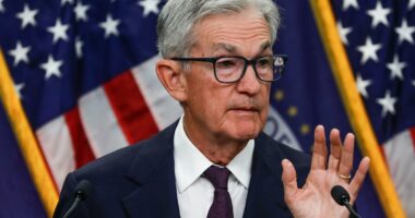 Stocks fall from all-time highs as Fed chair warns of unseen risk