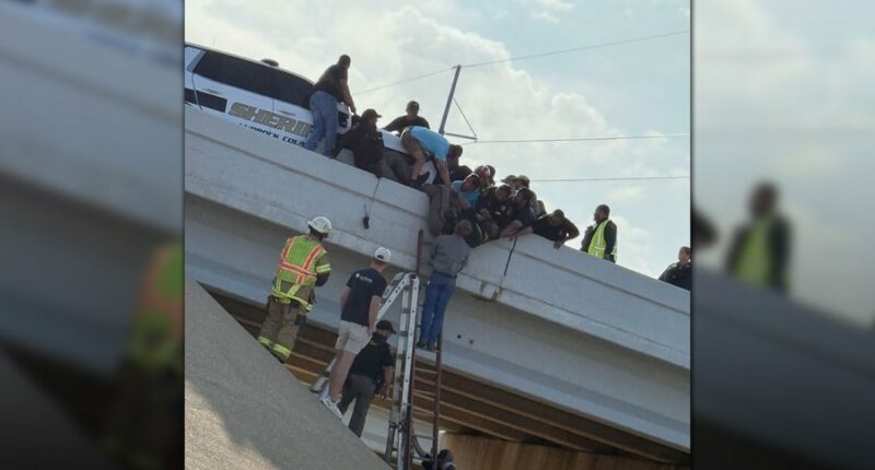 Texas deputy left dangling off overpass after crash