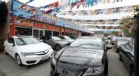 US car dealer files for bankruptcy as Americans drown in debt