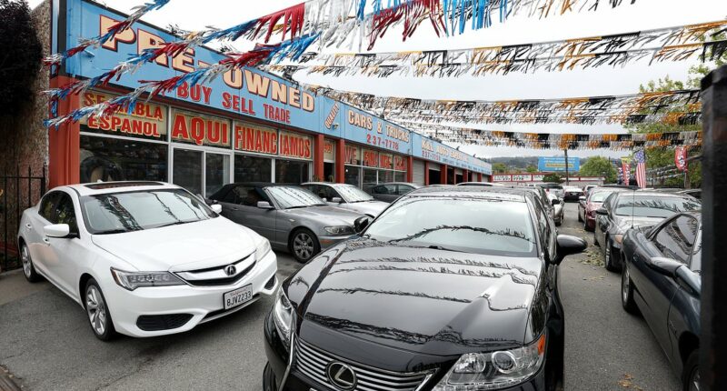US car dealer files for bankruptcy as Americans drown in debt