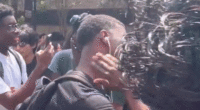 Video captures man acting out Charlie Kirk's assassination at Texas State vigil, Abbott calls for expulsion