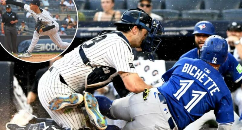 Yankees finally figure out how to beat Blue Jays after lengthy rain delay