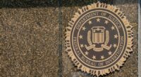 2 arrested after explosive device found under news van in Utah