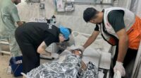 An American nurse in Gaza City films a hospital's collapse as Israeli forces surround it