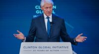 Bill Clinton sees this year's Clinton Global Initiative as a 'counterweight' to aid cuts