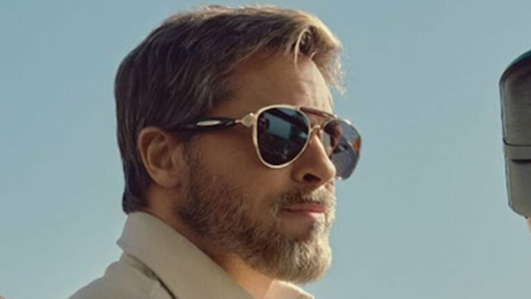 Brad Pitt, 61, sports a fluffy beard as he gives a nod to girlfriend Ines de Ramon, 32, during new commercial