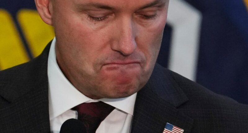 Utah Gov. Spencer Cox pauses as he speaks at a news conference, Friday, Sept. 12, 2025, in Orem, Utah. (AP Photo/Lindsay Wasson)