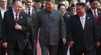 Front from left, Russian President Vladimir Putin, Chinese President Xi Jinping and North Korean leader Kim Jong Un arrive at a military parade.