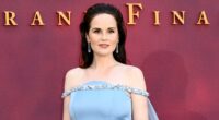 Downton Abbey star Michelle Dockery insists she's 'nothing like' her character Lady Mary Crawley as the star hits back at claims she's posh - after revealing her pregnancy at the premiere