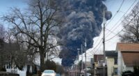 FILE - A black plume rises over East Palestine, Ohio, as a result of a controlled detonation of a portion of the derailed Norfolk Southern trains Monday, Feb. 6, 2023. (AP Photo/Gene J. Puskar, File)