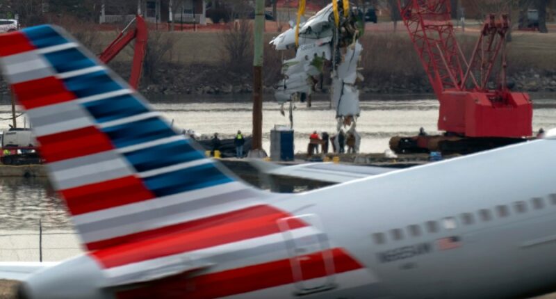 Family of 1 of the 67 Washington plane crash victims sues the FAA, Army and American Airlines