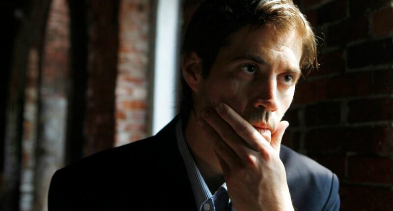 Journalist James Foley responds to questions during an interview in Boston on Friday, May 27, 2011. The family of slain American journalist Steven Sotloff filed a federal lawsuit Friday, May 13, 2022, accusing prominent Qatari institutions of wiring $800,000 to an Islamic State “judge” who ordered the murder of Sotloff and another American journalist, James Foley. (AP Photo/Steven Senne, File)