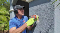 How to put up a flagpole on your concrete block home