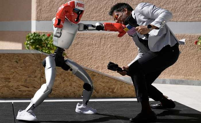 Humanoid robots showcase skills at Ancient Olympia. But they're on a long road to catch up to AI