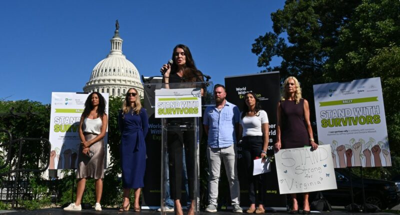 Survivors of convicted sex offender Jeffrey Epstein speak at a rally