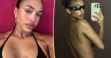 Lori Harvey strikes a sultry pose in a Gucci G-string (and no top) during tropical vacation