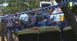 Police have stormed a unit and arrested a man after an hour of negotiations following a stabbing in western Sydney.