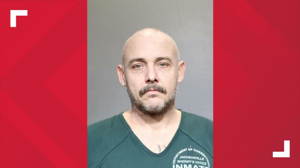 Man arrested after shooting woman at hotel