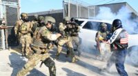 ICE officers clash with protestors at Broadview Illinois ICE facility.