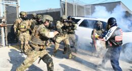 ICE officers clash with protestors at Broadview Illinois ICE facility.