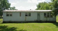 Man kept kid, elderly woman in 'unlivable' home: Police