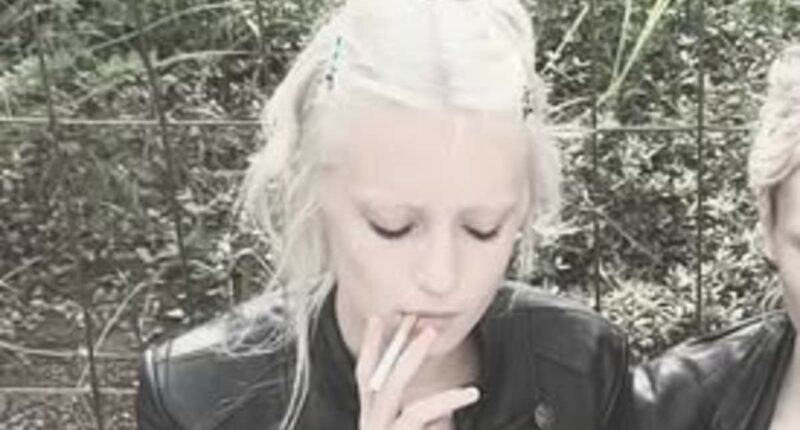 Naomi Watts' daughter,16, puffs on a cigarette in New York