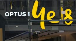 An Optus phone sign hangs above its store in Sydney