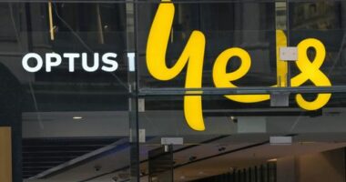 An Optus phone sign hangs above its store in Sydney