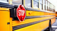 Parents stop school bus after driver allegedly swerving across lanes: police