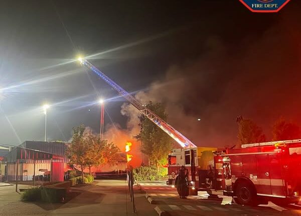 Spokane Valley firefighters work to extinguish blaze at Avista Stadium.