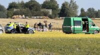 Police and Military Police secure parts of a damaged UAV shot down by Polish authorities  at a site in Wohyn, Poland.