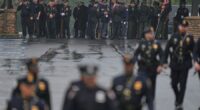 Police gather for funeral of 3 Pennsylvania detectives ambushed by gunman