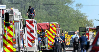 Police remain on scene at burned out Michigan church after shooting and fire leave 4 dead, 8 wounded