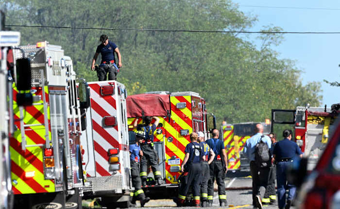 Police remain on scene at burned out Michigan church after shooting and fire leave 4 dead, 8 wounded