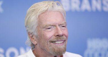 Richard Branson shows off nasty injury as he is pictured with face cut open